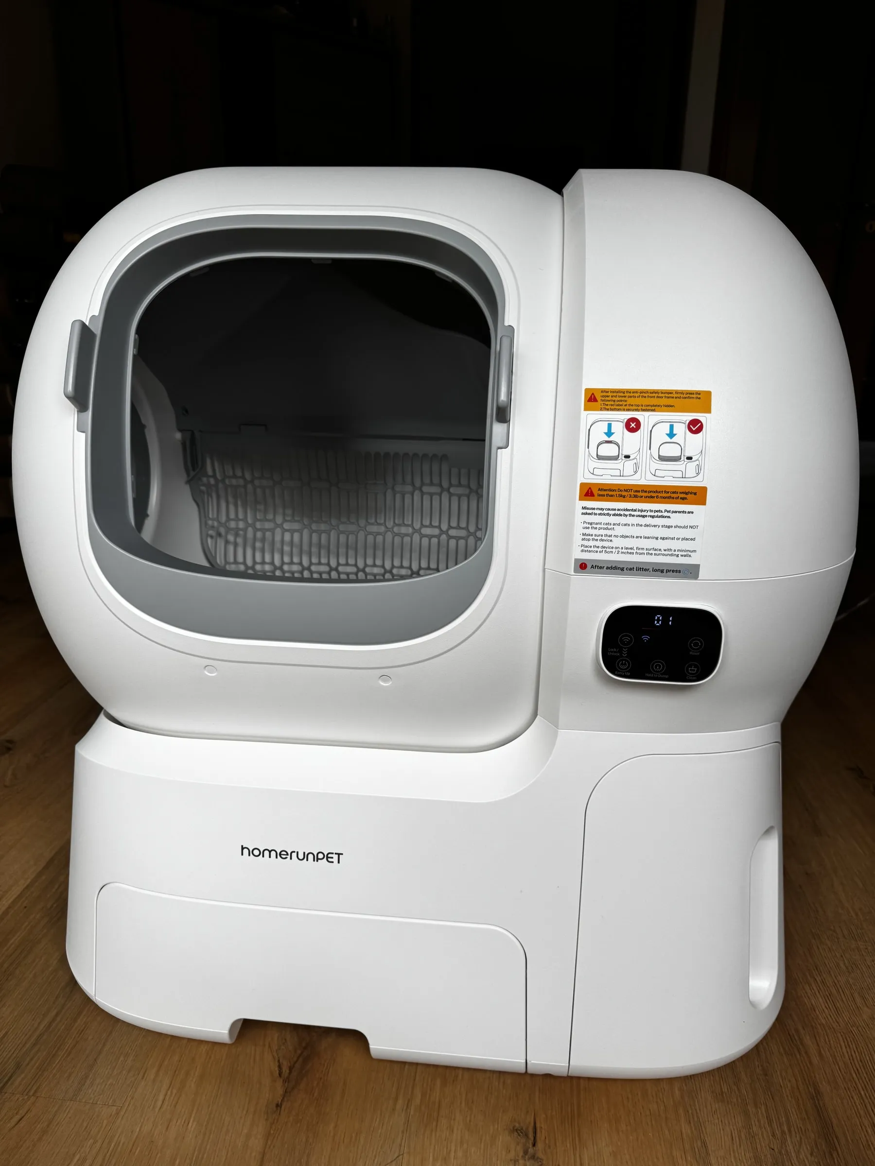 Front view of the homerunPET CS106 showing the wide entry opening and illuminated control panel