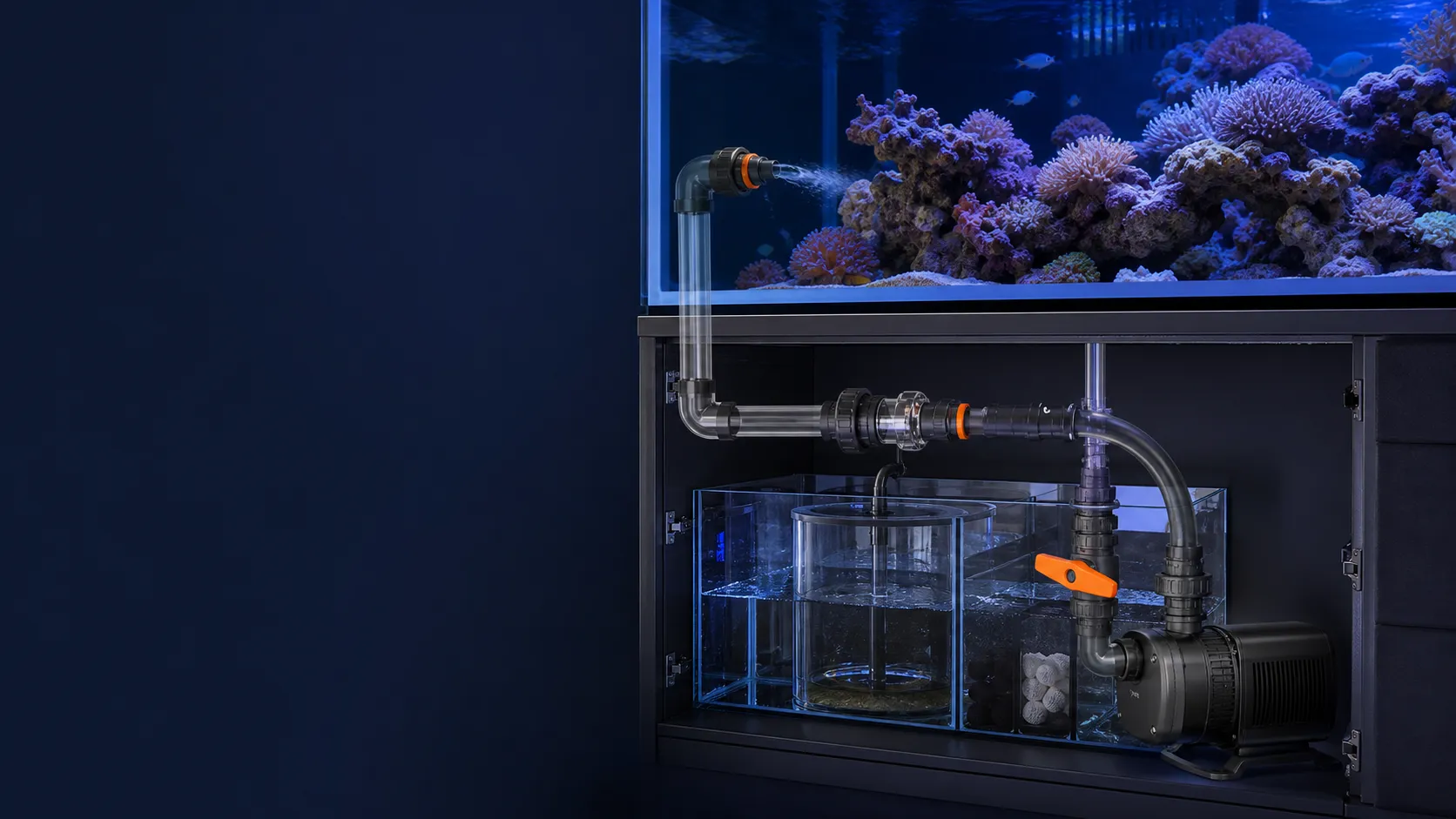 A reef aquarium with a sump, controllable DC return pump, clear return plumbing, valves, and an inline flow sensor